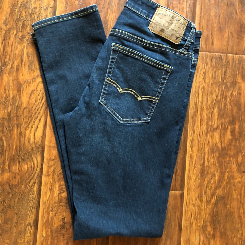 Dark distressed slim fit jeans